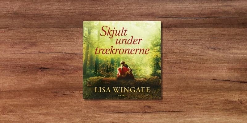 Skjult under traekronerne Lydbog